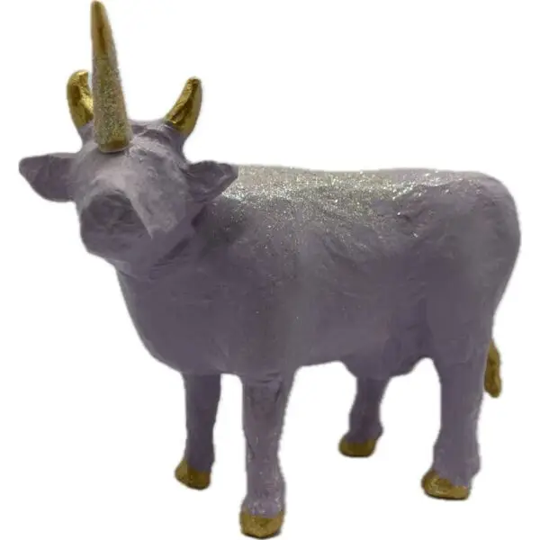 Licorrne. Une Vache décorative mauve avec une corne sur le front